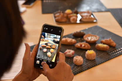 Students participating in a limited-time candle workshop in Vancouver studio.