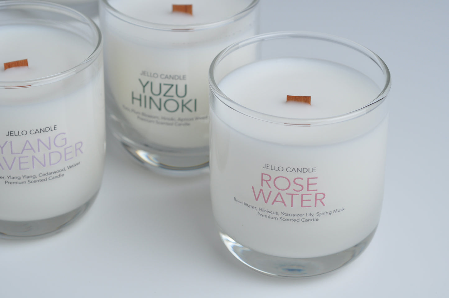 Aroma Container Candle in delicate Rose Water scent, emphasizing its premium ingredients and stylish design.