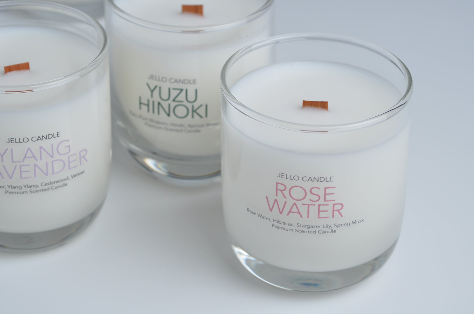 Aroma Container Candle in delicate Rose Water scent, emphasizing its premium ingredients and stylish design.