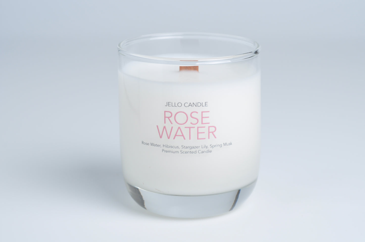 Aroma Container Candle in Rose Water scent, emphasizing the natural ingredients and elegant container design.