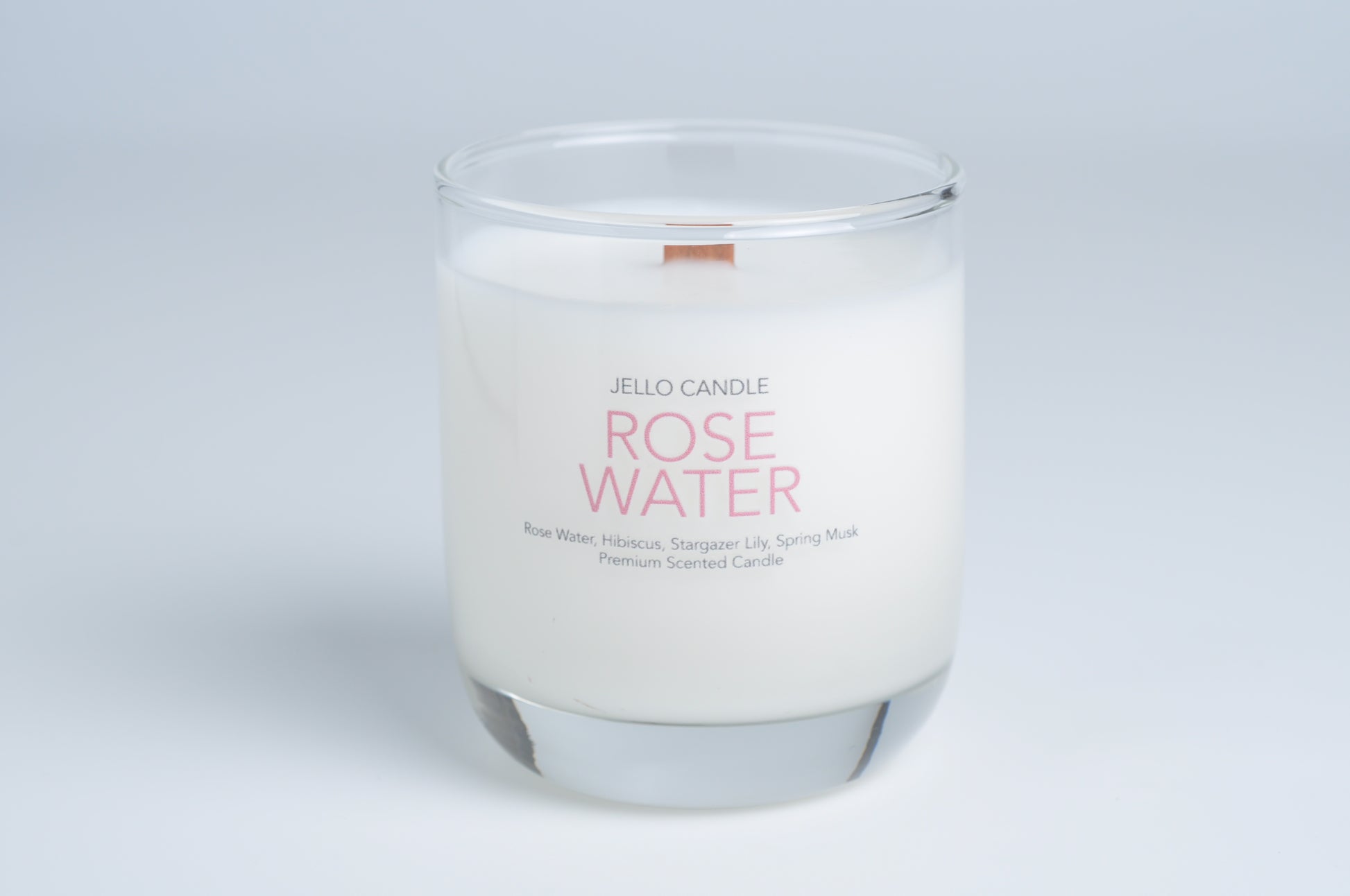 Aroma Container Candle in Rose Water scent, emphasizing the natural ingredients and elegant container design.