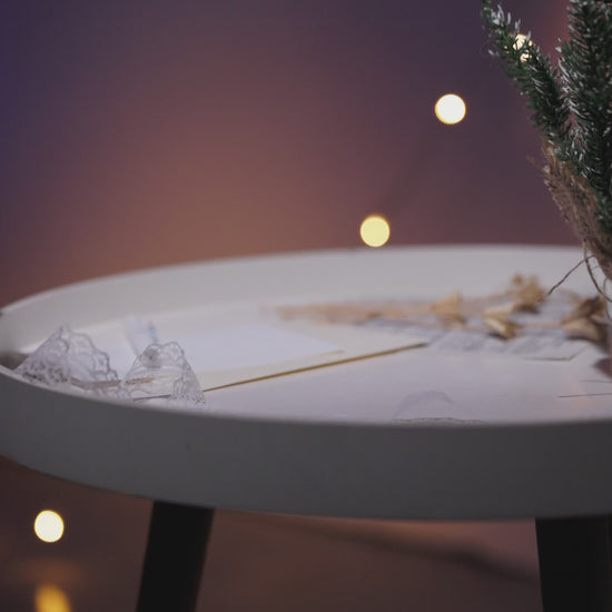 30-second video of the Snowball Candle showcasing its hollow design and inner glow for festive décor.